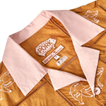 Close-up image of 'The Sopranos' Satriale's (Pruh-Zhoot) that showcases the Custom woven 'The Sopranos' x Tombolo interior label, including special pig logo from Satriale's storefront and a "Limited Edition: x of 100" interior tag.