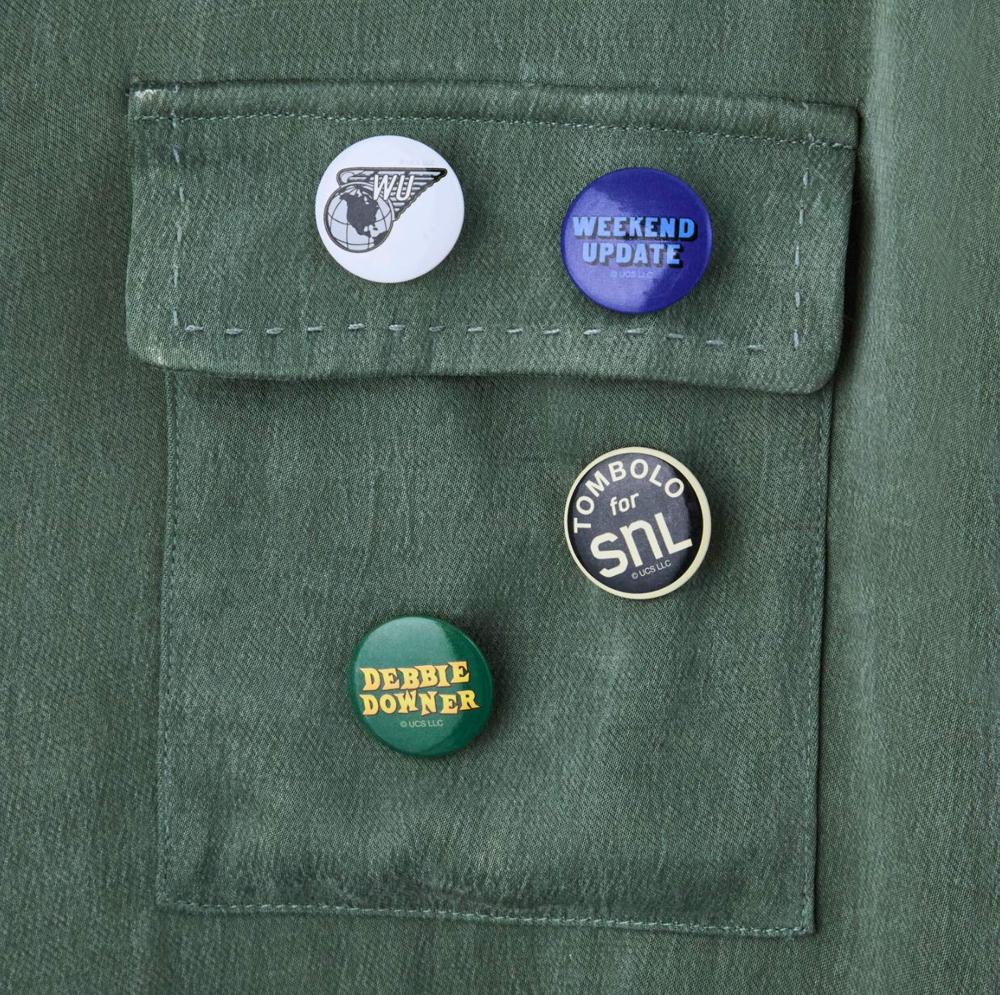 Close-up of SNL pins on front pocket. 