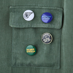 Close-up of SNL pins on front pocket. 
