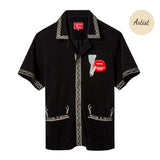 Black short-sleeve terry cloth shirt with cream embroidered trim and an embroidered graphic of red lips holding a lit cigarette on the left chest.