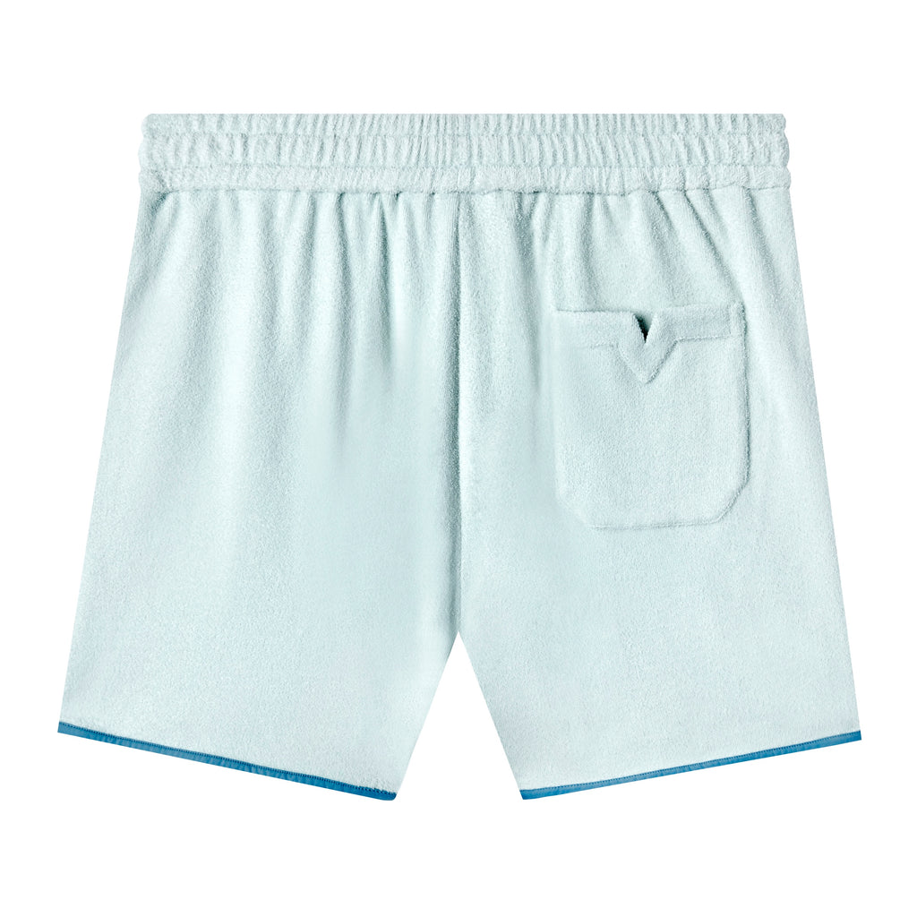 Backwards-facing image of the 'Standard Issue' Cabana Shorts (Sky Blue) that showcases the Tombolo signature 'V' slit back pocket.
