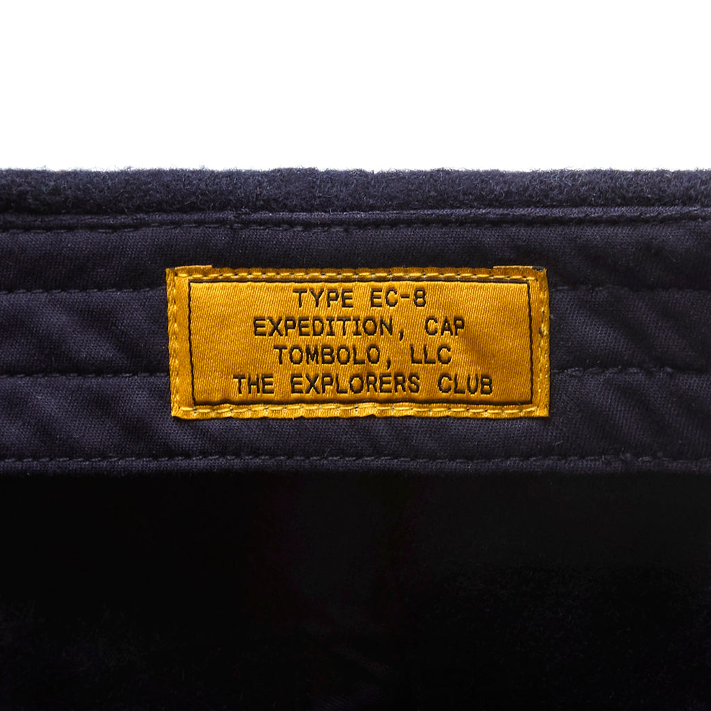 Interior label of Explorers Club Cab reading "Type EC-8. Expedition, Cap. Tombolo, LLC. The Explorer's Club" 