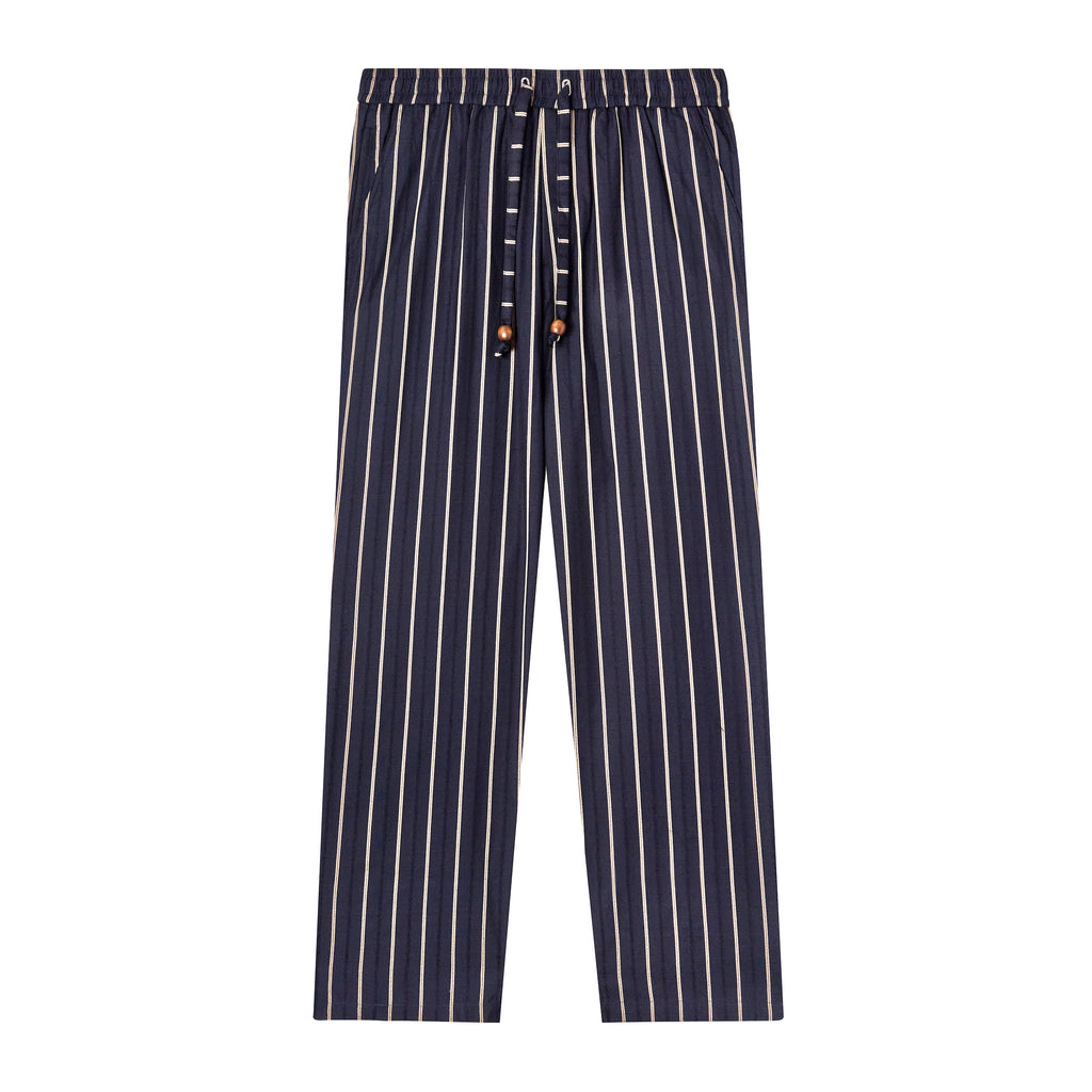 Flat lay product photo of navy pants with white vertical striped and flat navy drawstring