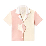 Layflat of conched out shirt on white background