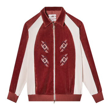 Front-facing product image of 'The Sopranos' Pie-O-My Jacket made of Organic Cotton Velour that features a burgundy and pink raglan sleeve construction, collar, full-length brass zipper, and a chain-stitched embroidery detail with horseshoes on front panels