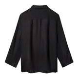Backside of Black Linen Tuxedo Jacket.
