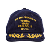 Navy wool baseball cap with gold embroidery. The front panel reads “THE EXPLORERS CLUB / TERRA MARI CAELOQUE / EST. 1904” in all caps. The brim features gold embroidered laurel-like detailing, giving the cap a vintage, nautical-inspired look.
