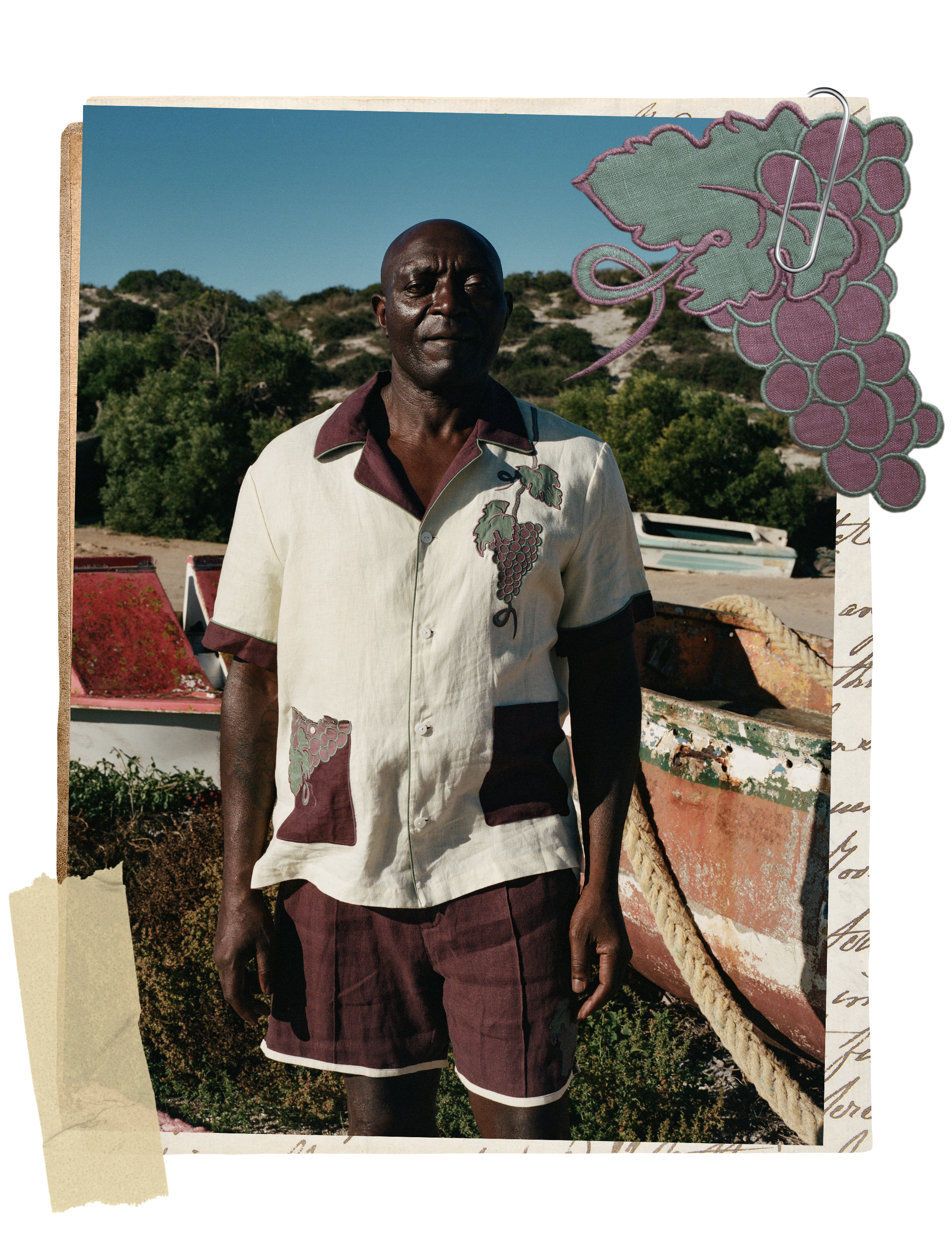 Man casually stands in the full wine-themed linen Tombolo set 