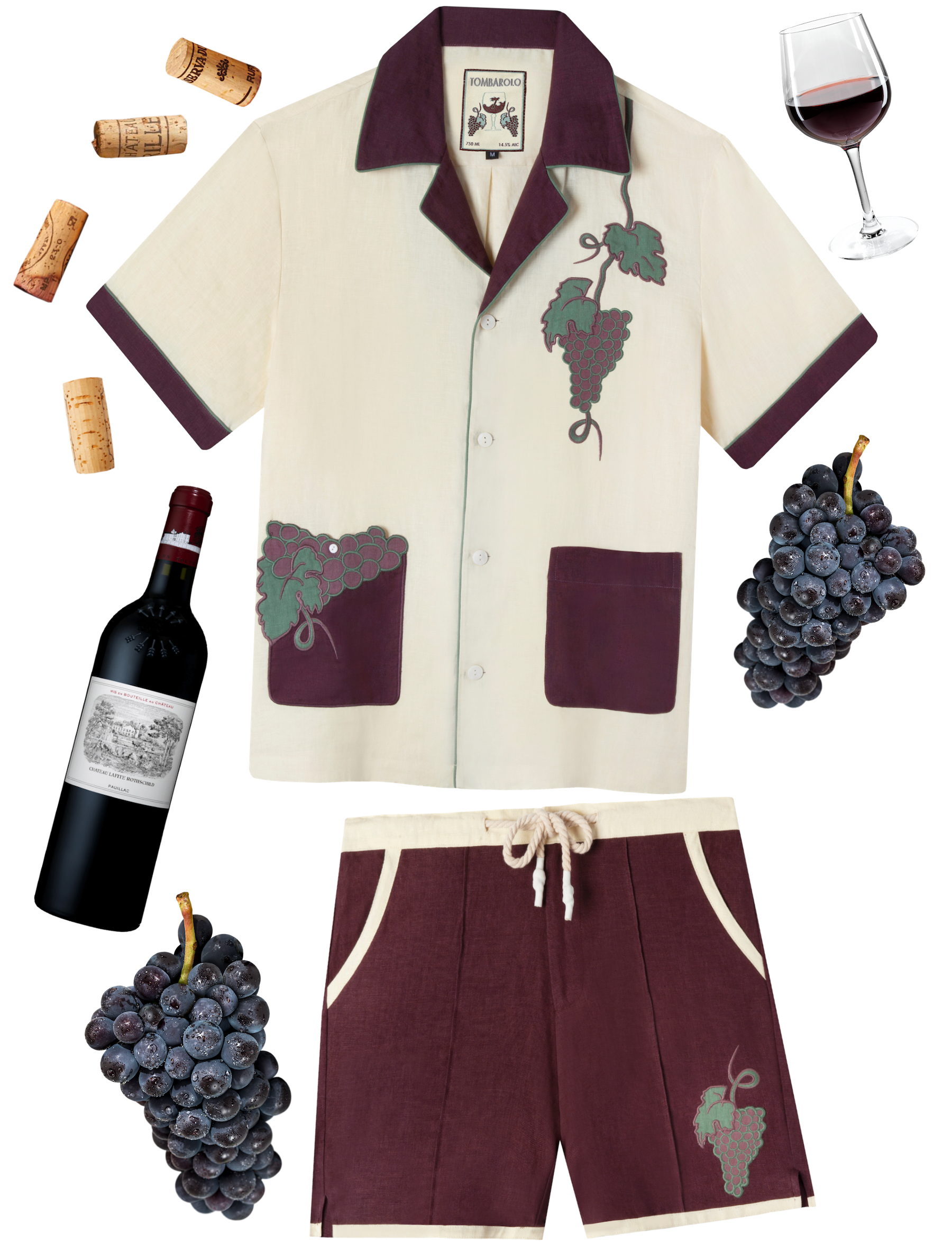 Lay-flat image of the wine-themed linen Tombolo set surrounded by wine ephemera (ie. wine glass, grapes, corks, and wine bottle)