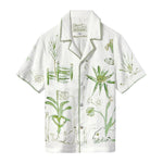 A short-sleeve white shirt with green botanical and abstract designs, part of our 2024 artist collaboration.