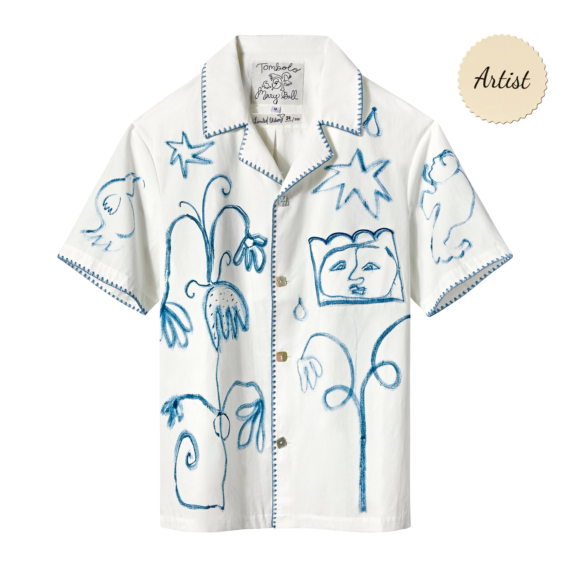 White short-sleeve shirt with blue line art of abstract faces, plants, and animals. Blue stitching decorates the edges.