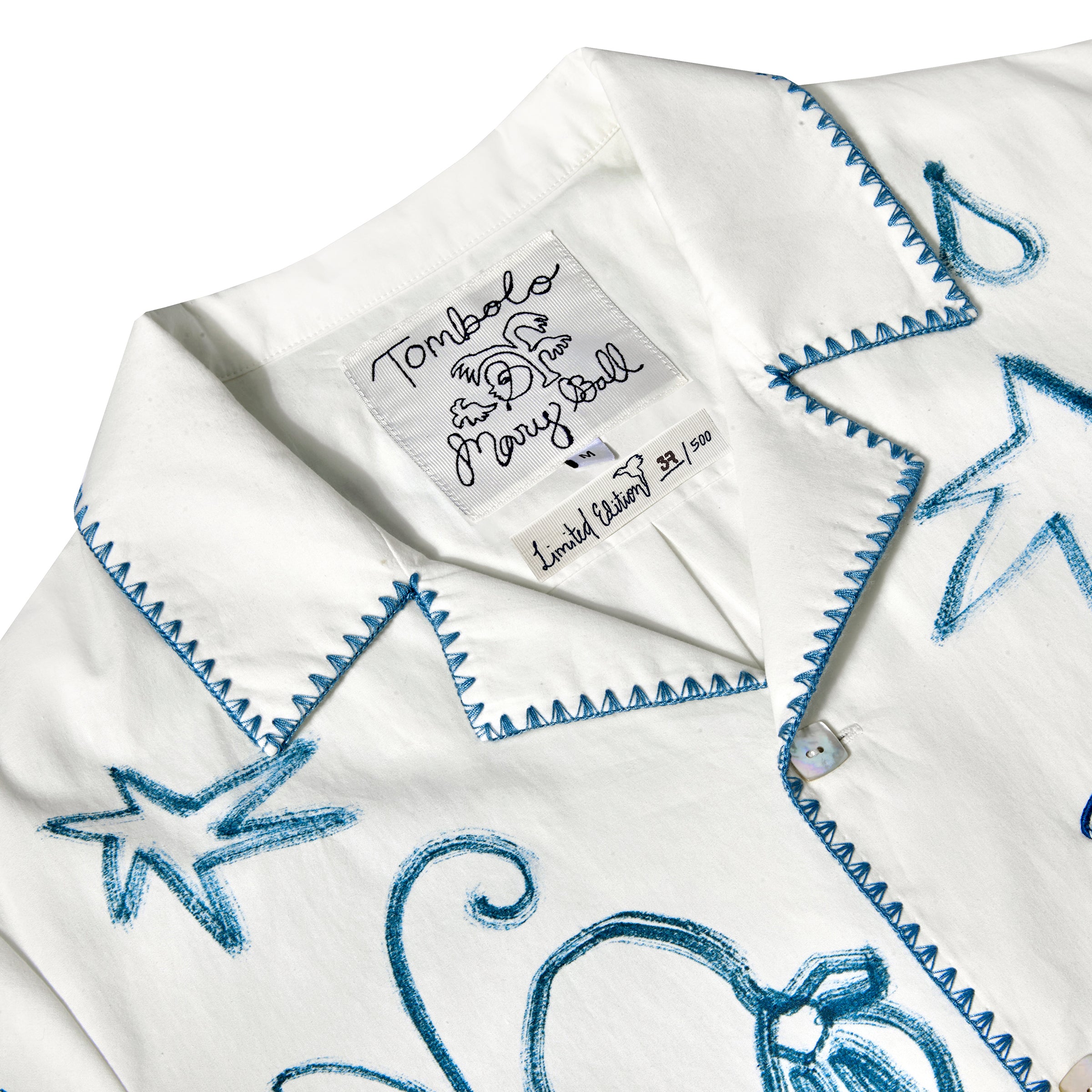 Close up of the interior label for the 'Seasons of Change' Shirt.