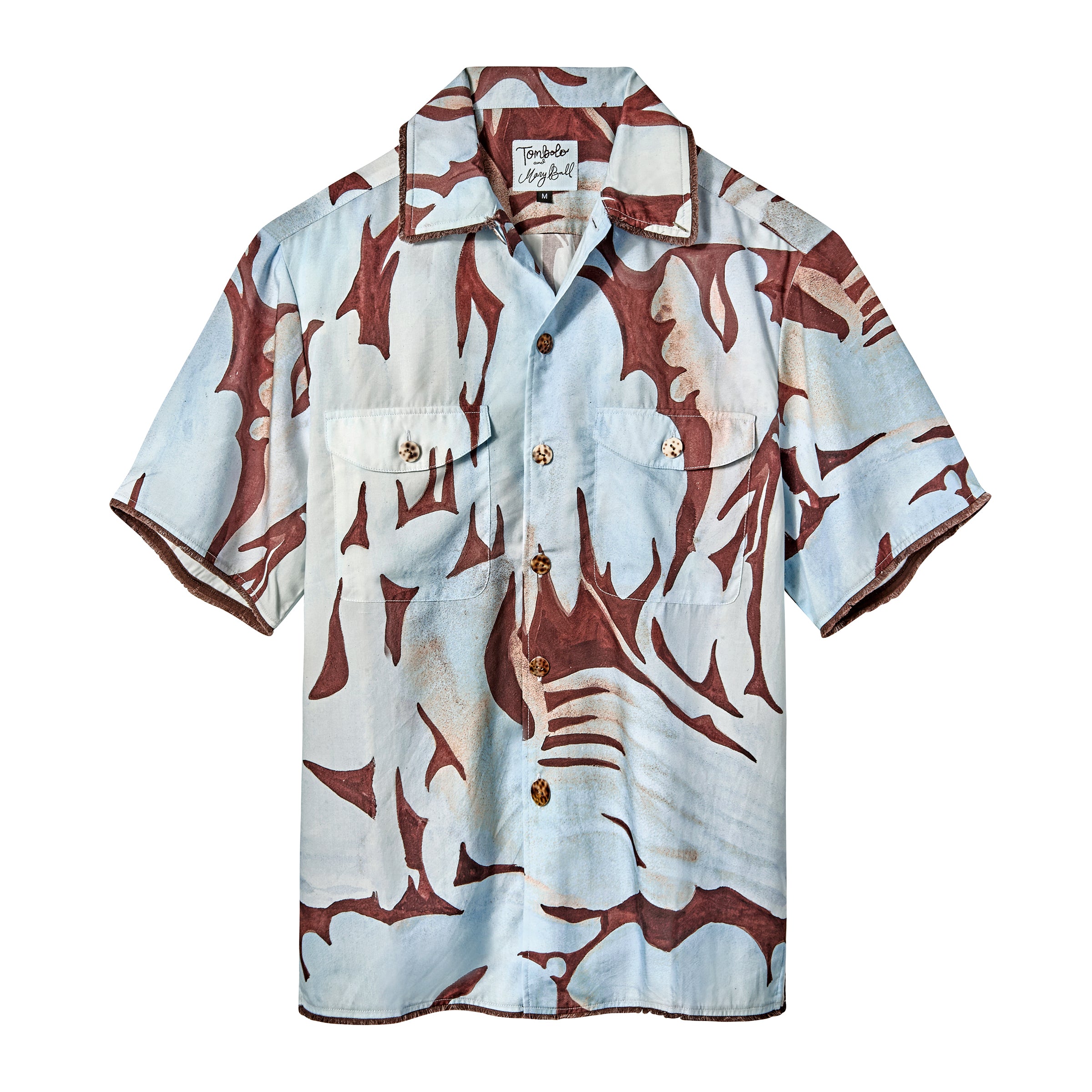 A short-sleeve button-up shirt in light blue and brown, with an abstract, wavy camouflage-style pattern. It has two front chest pockets and a pointed collar.