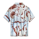 Back side of abstract brown and blue shirt designed by Artist Mary Ball. 