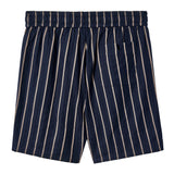 image of backside of navy shorts with beige vertical stripes, an elastic waistband,  and a back pocket on the right side. 