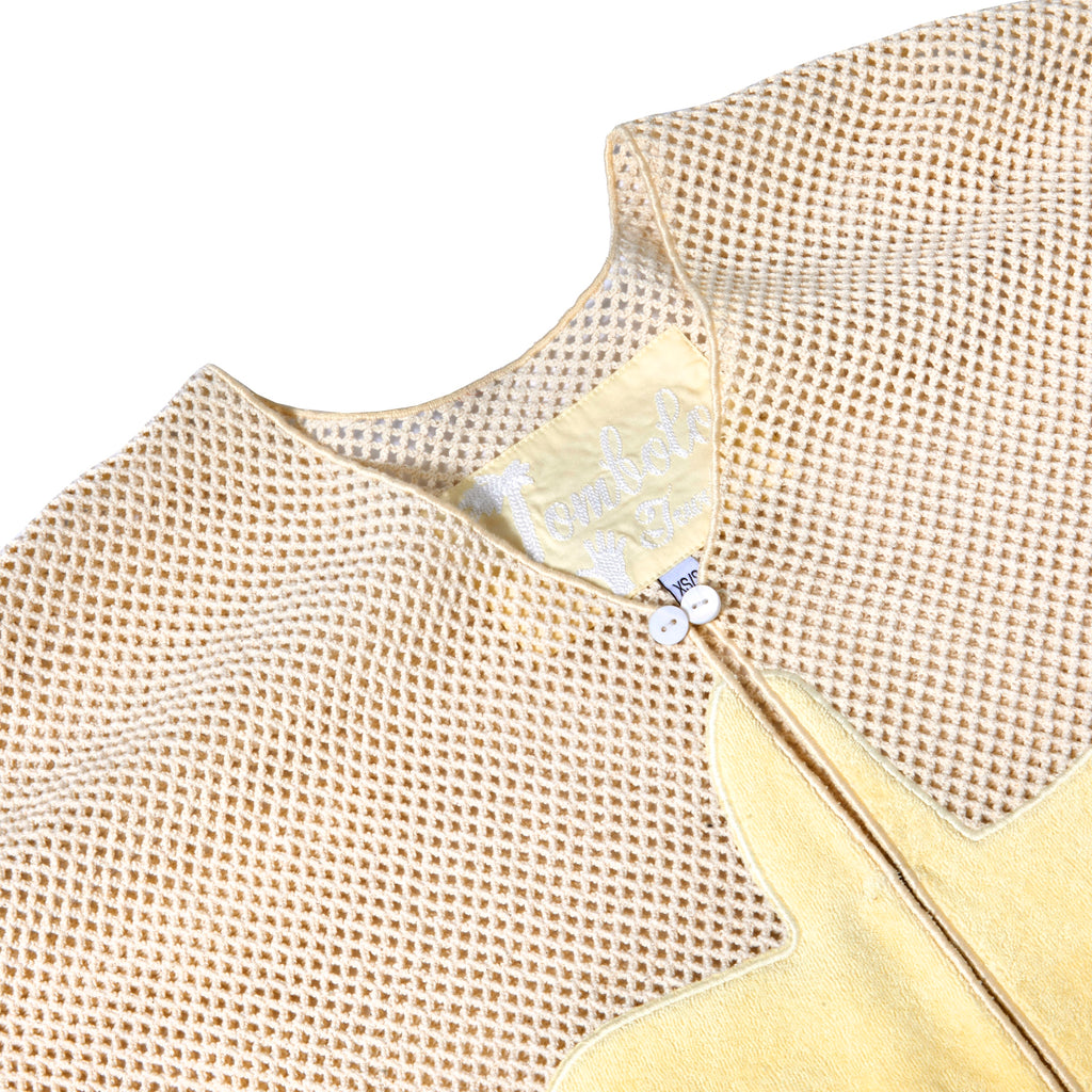 Close-up of 'Starfish Strut' Hand Towel Top interior label. 