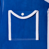 Close up of white piping on pocket