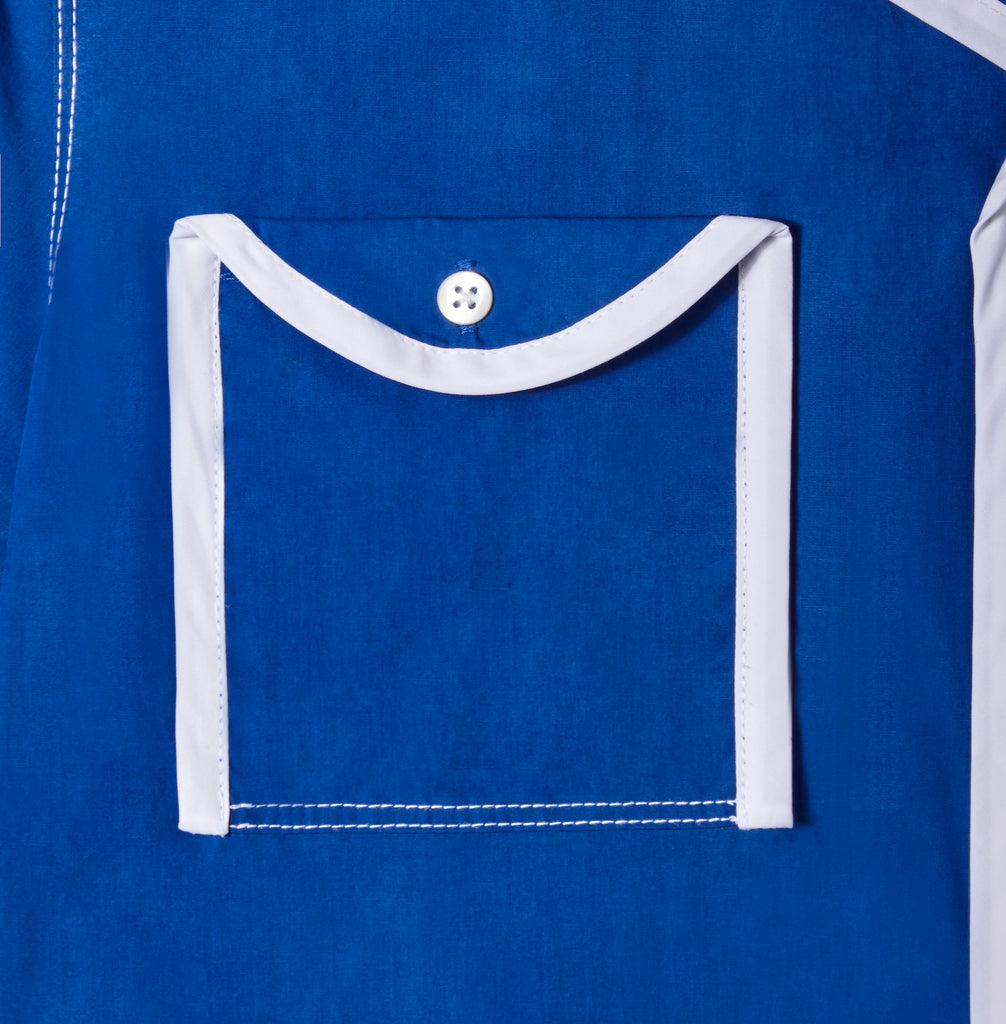 Close up of white piping on pocket