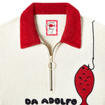 Close up of metal zipper, red terry cloth collar and interior label showing Da Adolfo x Tombolo collab