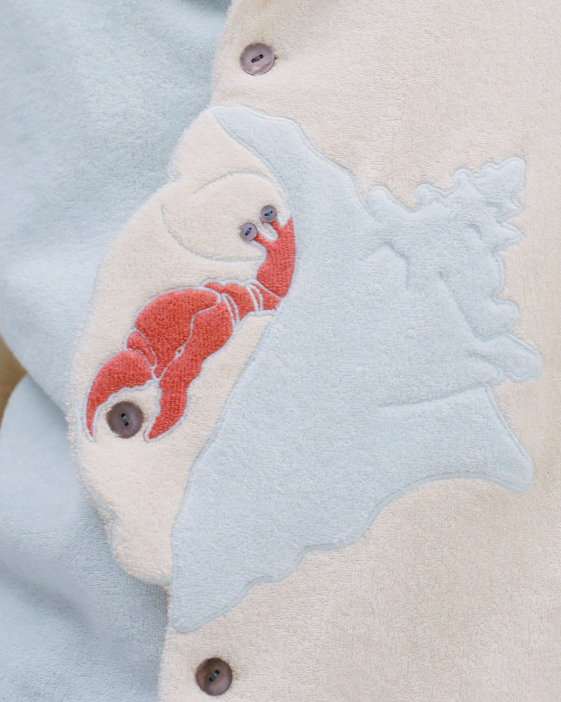 Close up of Hermit Crab terry cloth applique detail.