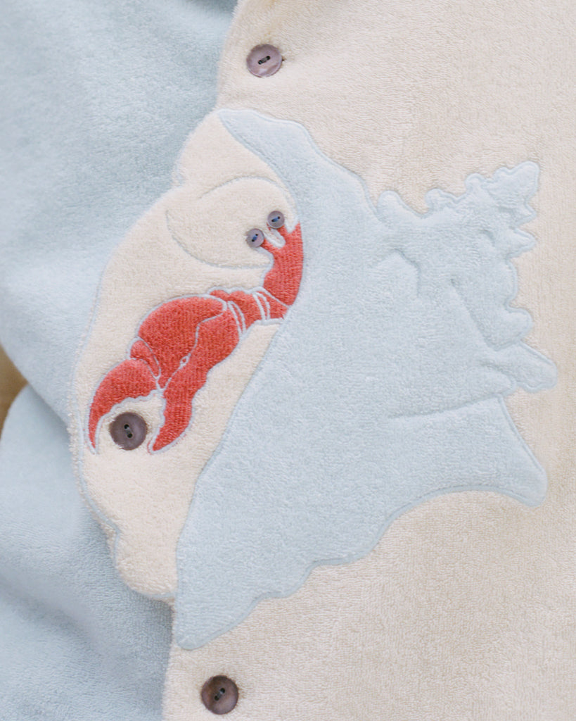 Close up of Hermit Crab terry cloth applique detail.