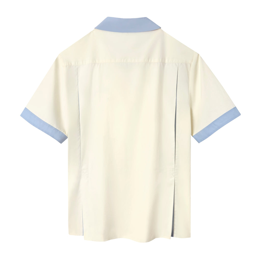 Back-side of 'Explorer's Club' Field Uniform, featuring a cream shirt with light blue collar and cuffs. 