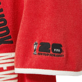 Close-up of FIFA 26 logo on wearer's sleeve.
