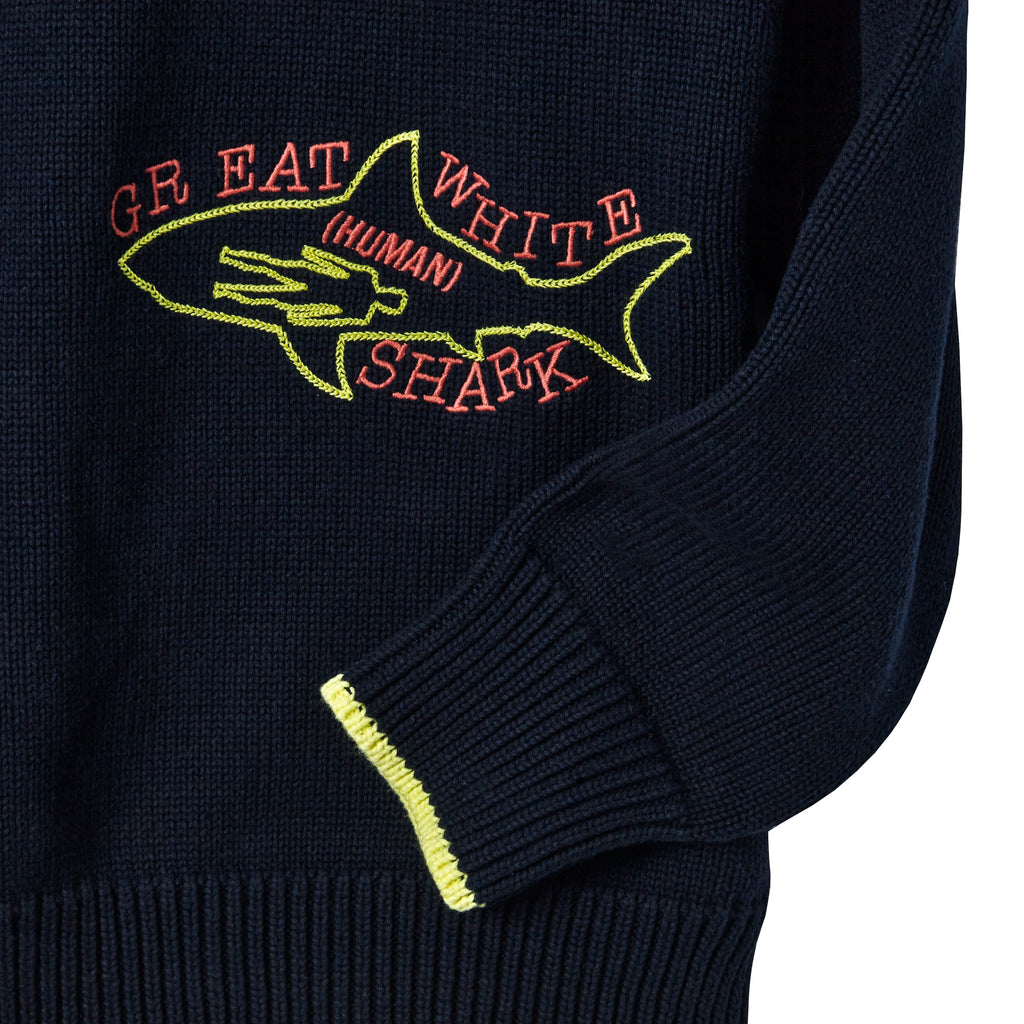 Detailed shot of the 'Great White Shark" embroidery, witha "human" on the inside.