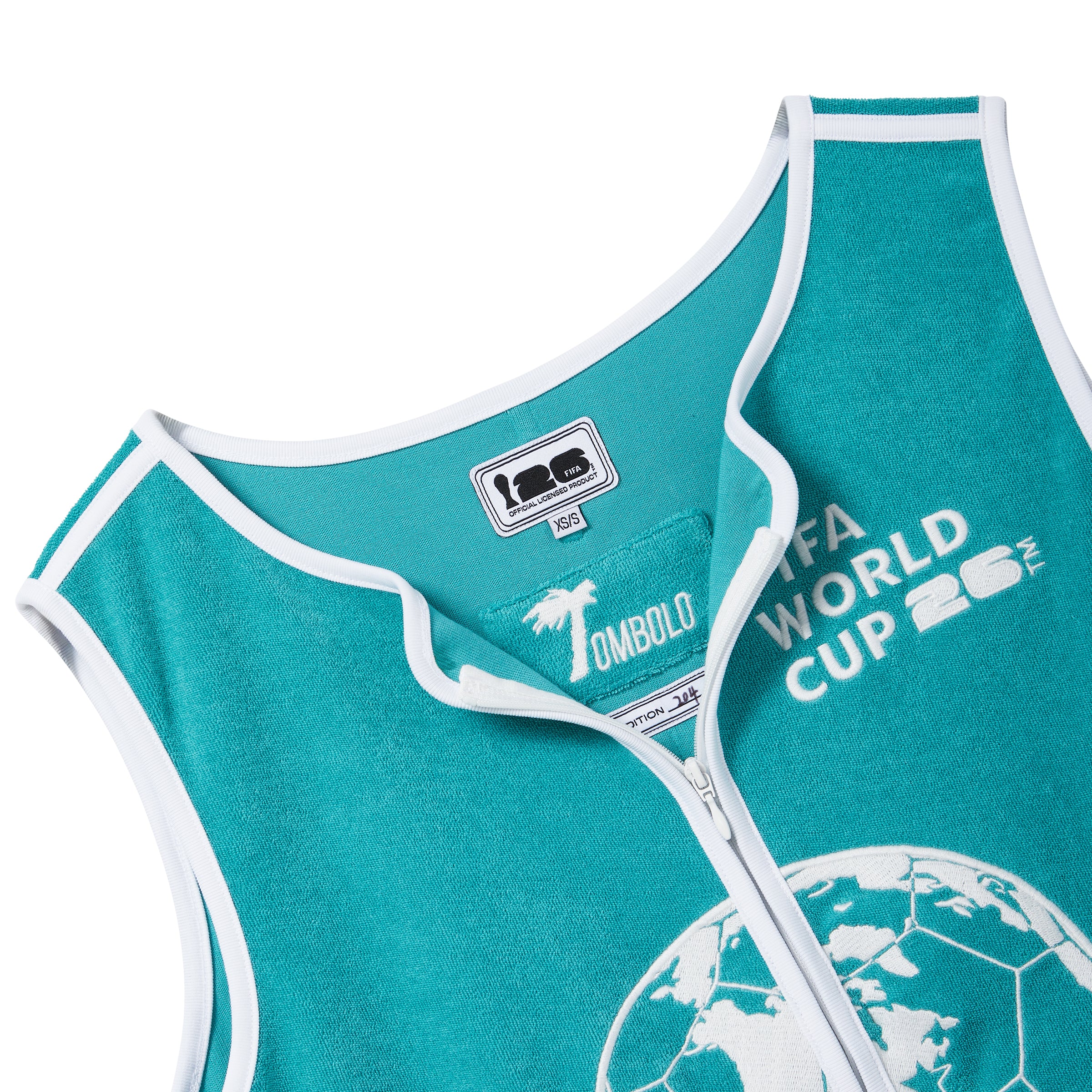 Close-up of teal terry cloth hand towel top with white trim, front zipper, and FIFA World Cup 2026 embroidery.