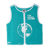 Teal terry cloth hand towel top with white trim, front zipper, and embroidery featuring a globe and FIFA World Cup 2026 logo.
