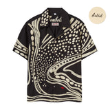 Black short sleeve cabana shirt with all-over cream chain-stitch embroidery in an abstract dotted and wave pattern, button front.