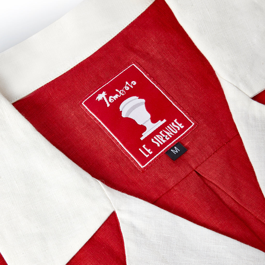 Close up of the Tag featuring a large marble vase