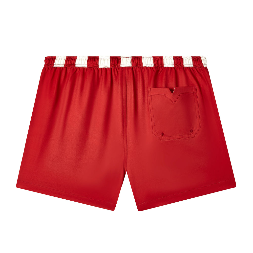 Back side of swim trunks showing v slit in pocket