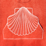 Close-up product image of the 'Scallop' Beach Towel Top's edge-embroidered scallop shell-shaped kangaroo pocket.