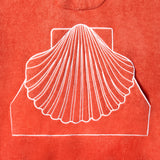 Close-up product image of the 'Scallop' Beach Towel Top's edge-embroidered scallop shell-shaped kangaroo pocket.
