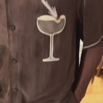 Close up video of the Espresso Martini Cabana shirt. 