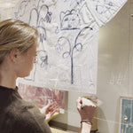 Video of Artist Mary Ball signing her name at the bottom corner of her artwork!