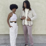 Man and woman wearing quilted jackets