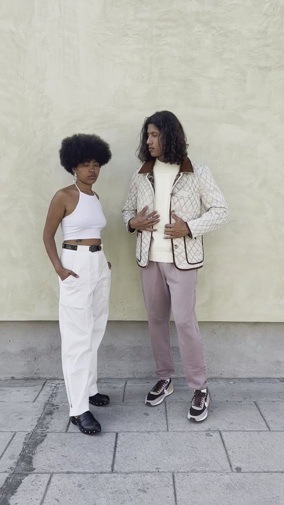 Man and woman wearing quilted jackets