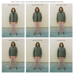 Man wearing quilted jacket in size small to Large to demonstrate sizing