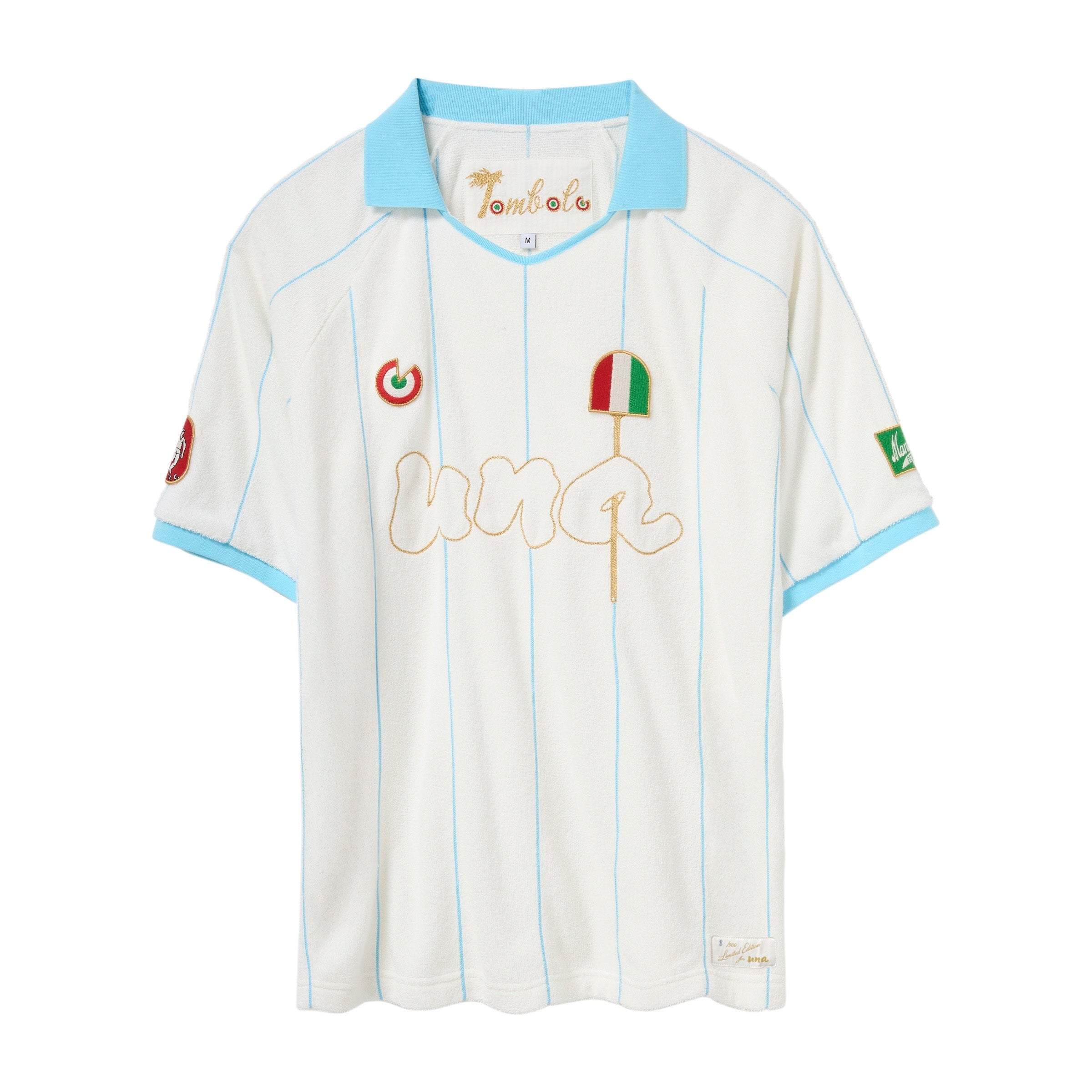 A vintage-style soccer jersey by Una and Tombolo, featuring an off-white body with light blue trim on the collar and sleeves, vertical light blue pinstripes, and gold embroidered details including 'Una' embroidery and a pizza graphic with an Italian flag.