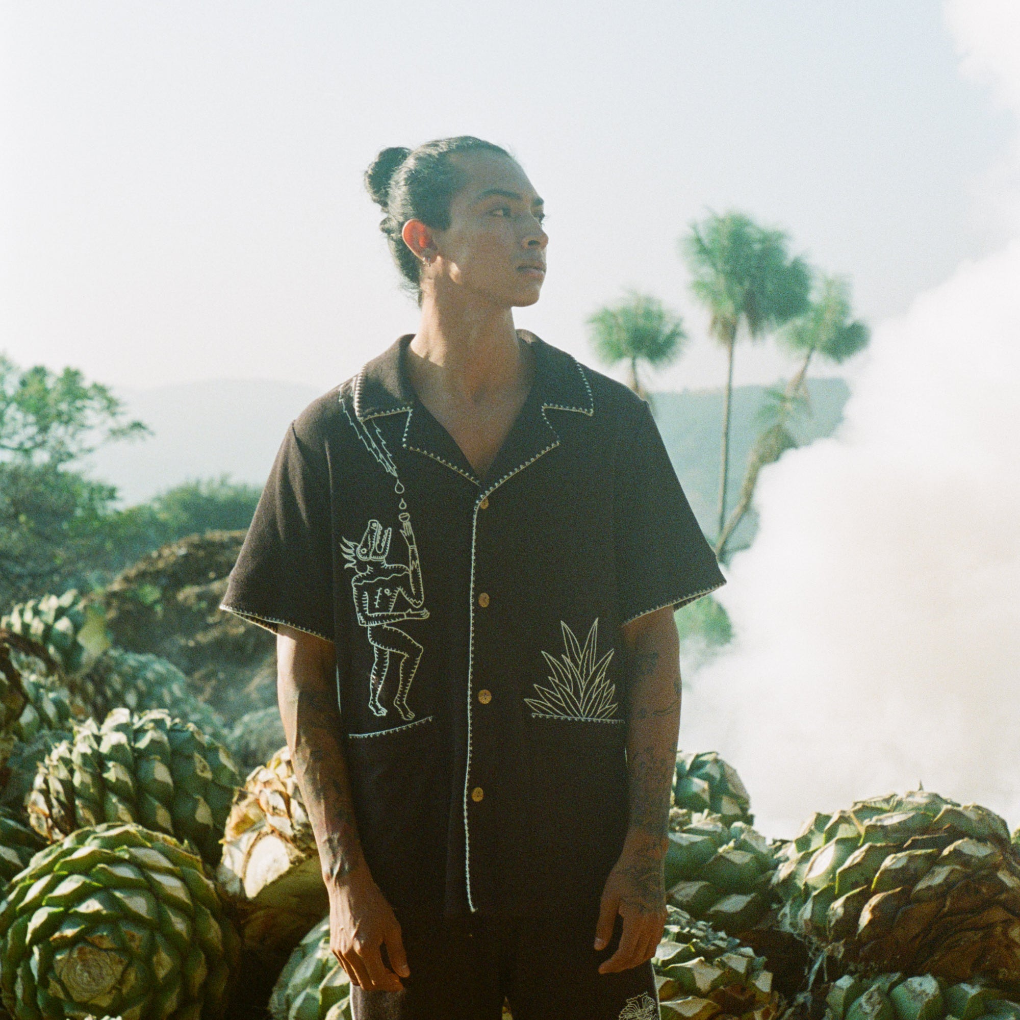 Tombolo and Agua Magica matching terry cloth cabana set with pre-Colombia figurines