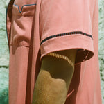 Close up of window paneling on male model