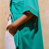 Side view of teal cabrisa showing white accents