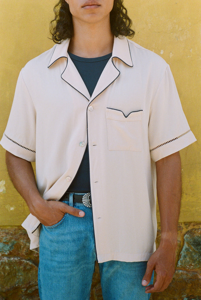 male model wearing his cabrisa with one button buttoned