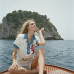 Female model with pop over on boat deck