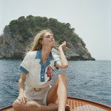 Female model with pop over on boat deck