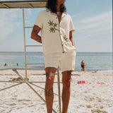 full body shot of man on beach 
