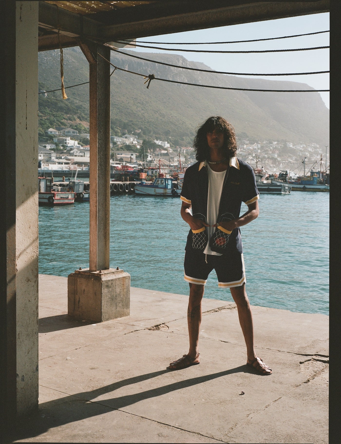 Man stands on dock