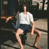 man sits on bench